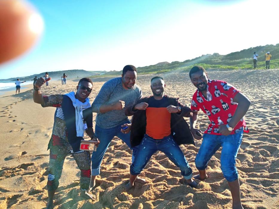 Adedotun, Stephen, Paul and Tatenda showing physical strength